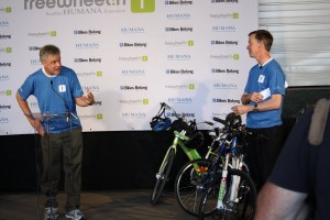 Tim Blumenthal addresses Denver Mayor John Hickenlooper at a press conference on Sunday